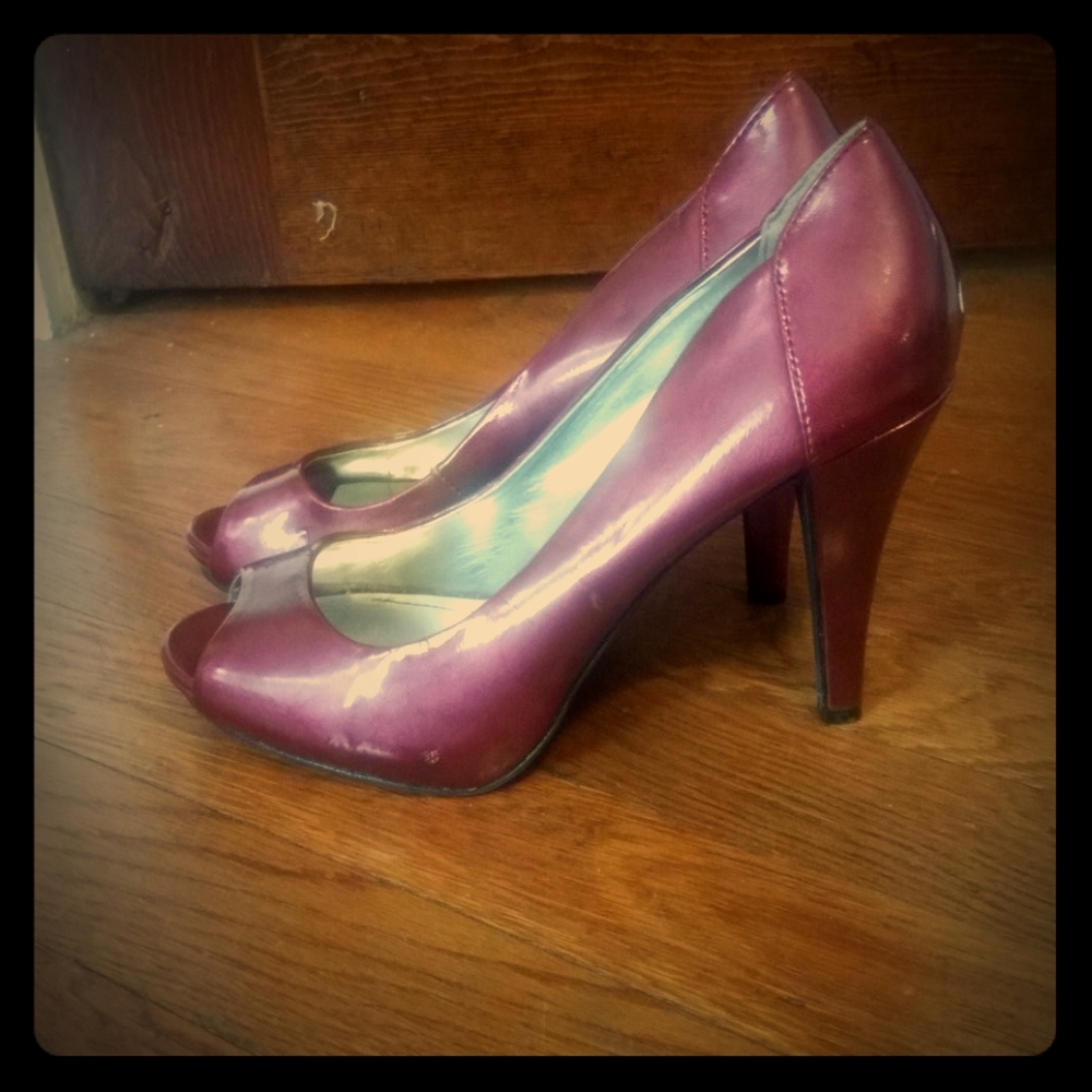 Cranberry peep-toe pumps